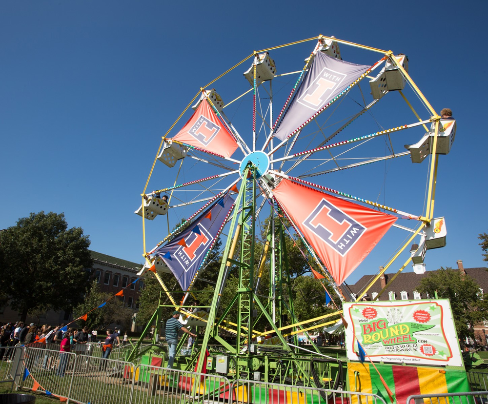 Ferris wheel with With Illinois banners on the Illinois Main Quad
