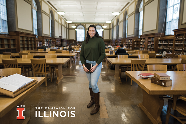 Female student in undergraduate library - With Illinois Campaign logo